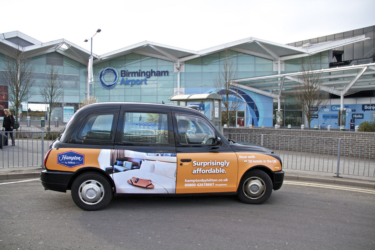 2013 Ubiquitous taxi advertising campaign for Hampton By Hilton - Surprisingly Affordable