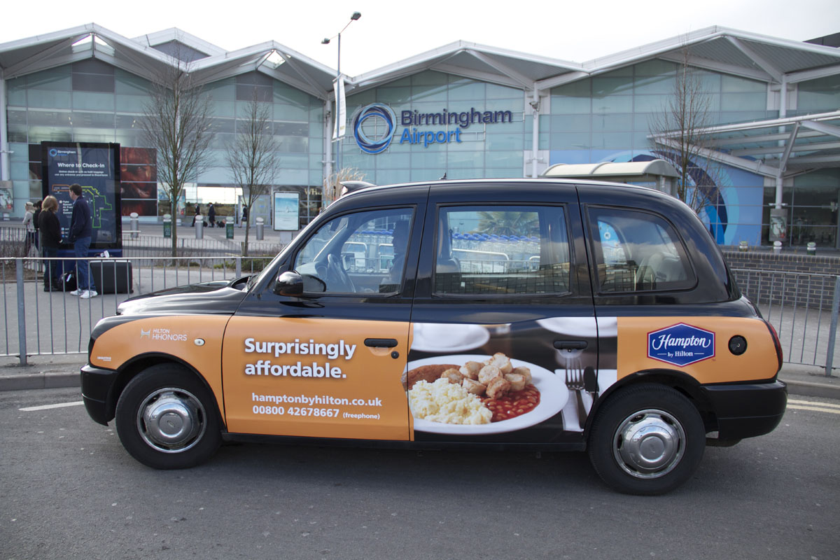 2013 Ubiquitous taxi advertising campaign for Hampton By Hilton - Surprisingly Affordable