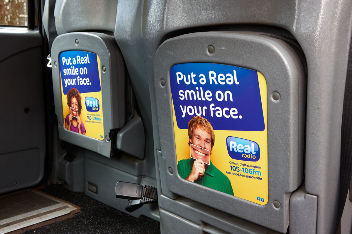 2012 Ubiquitous taxi advertising campaign for Real Radio - Put a Real Smile on your Face